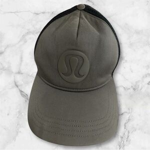 Lululemon Trucker Hat Logo in a Grey Color with Black Mesh Back.